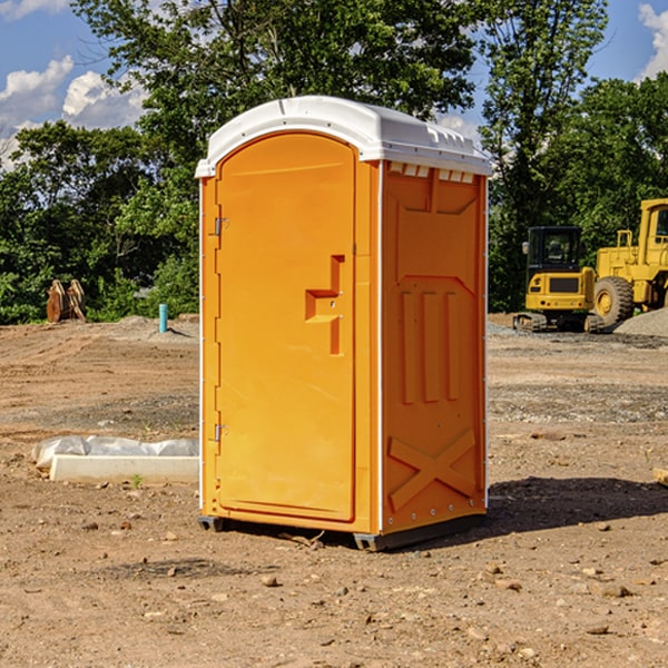 how often are the portable restrooms cleaned and serviced during a rental period in Kilbourne